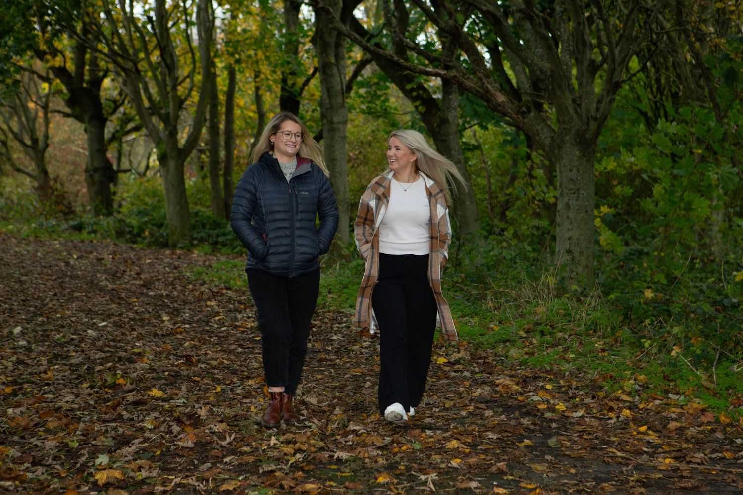 Kate with a client on a walk